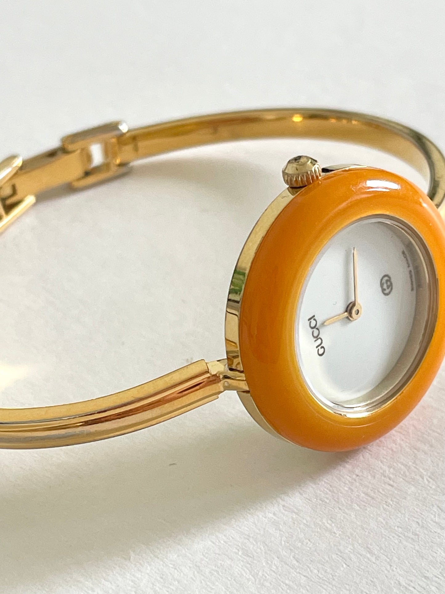 Vintage Gucci Women’s Watch – Gold Bangle with Interchangeable Orange Bezel