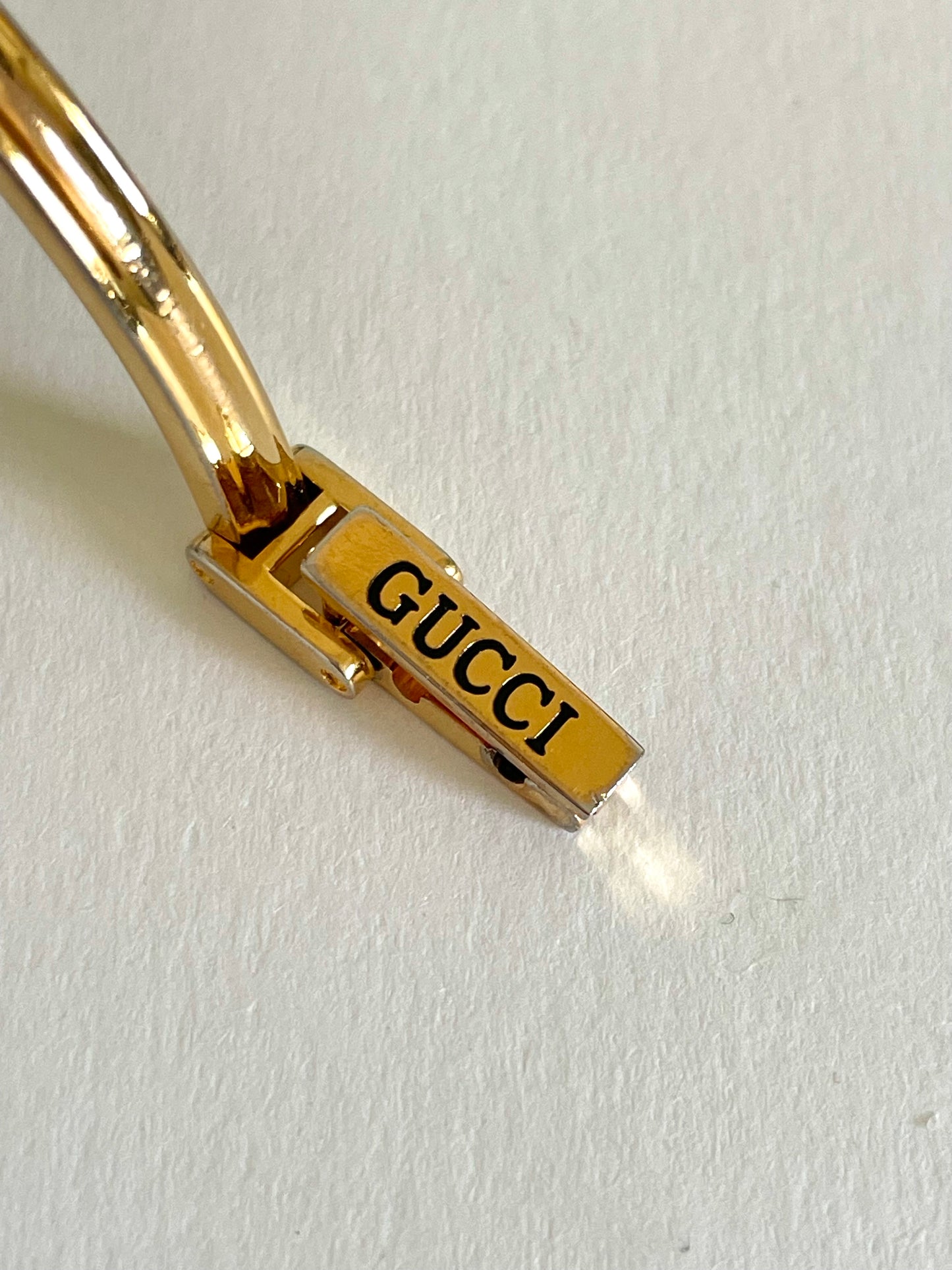 Vintage Gucci Women’s Watch – Gold Bangle with Interchangeable Orange Bezel