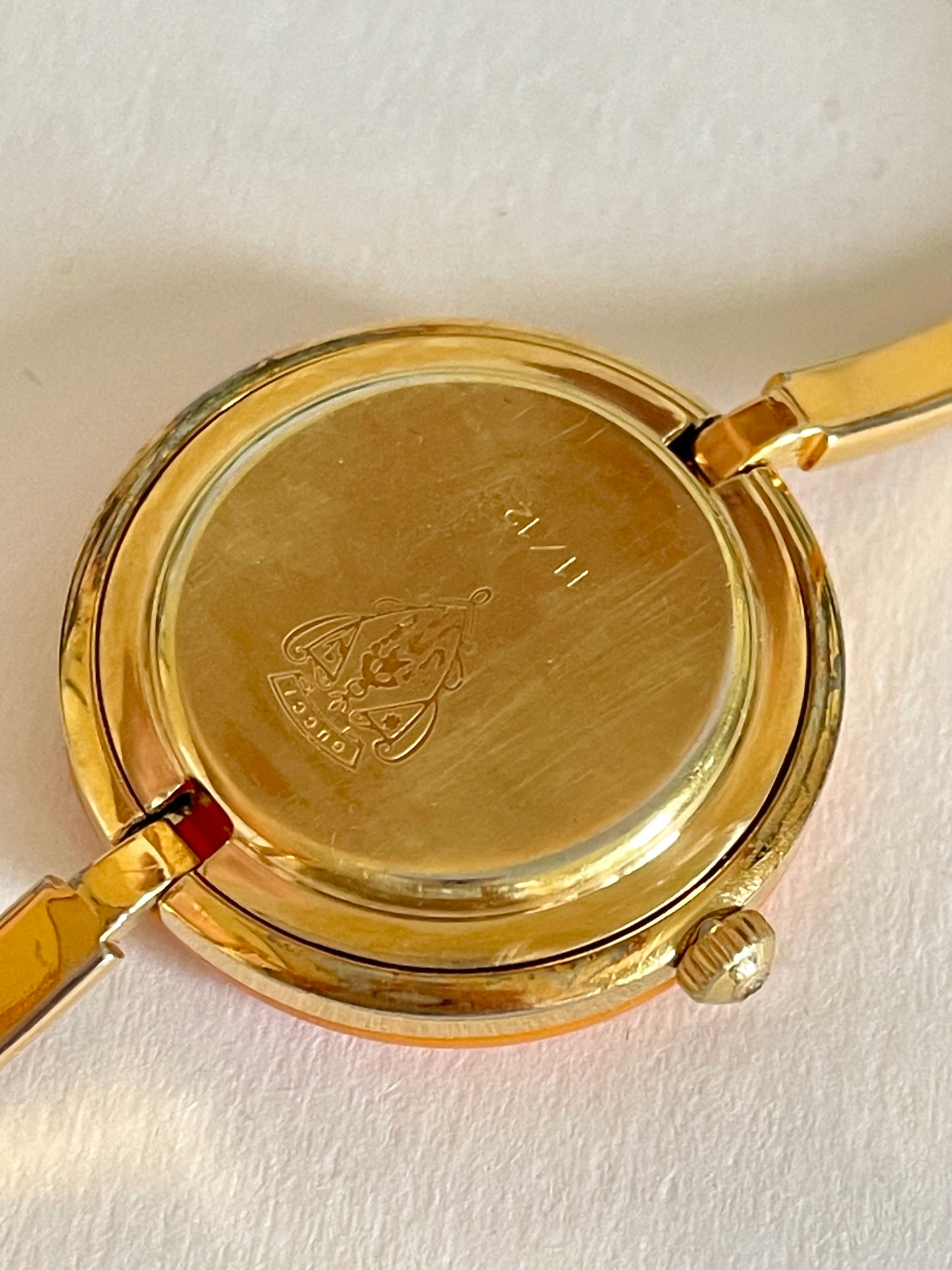 Vintage Gucci Women’s Watch – Gold Bangle with Interchangeable Orange Bezel
