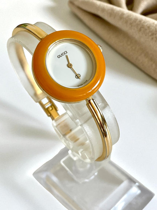 Vintage Gucci Women’s Watch – Gold Bangle with Interchangeable Orange Bezel
