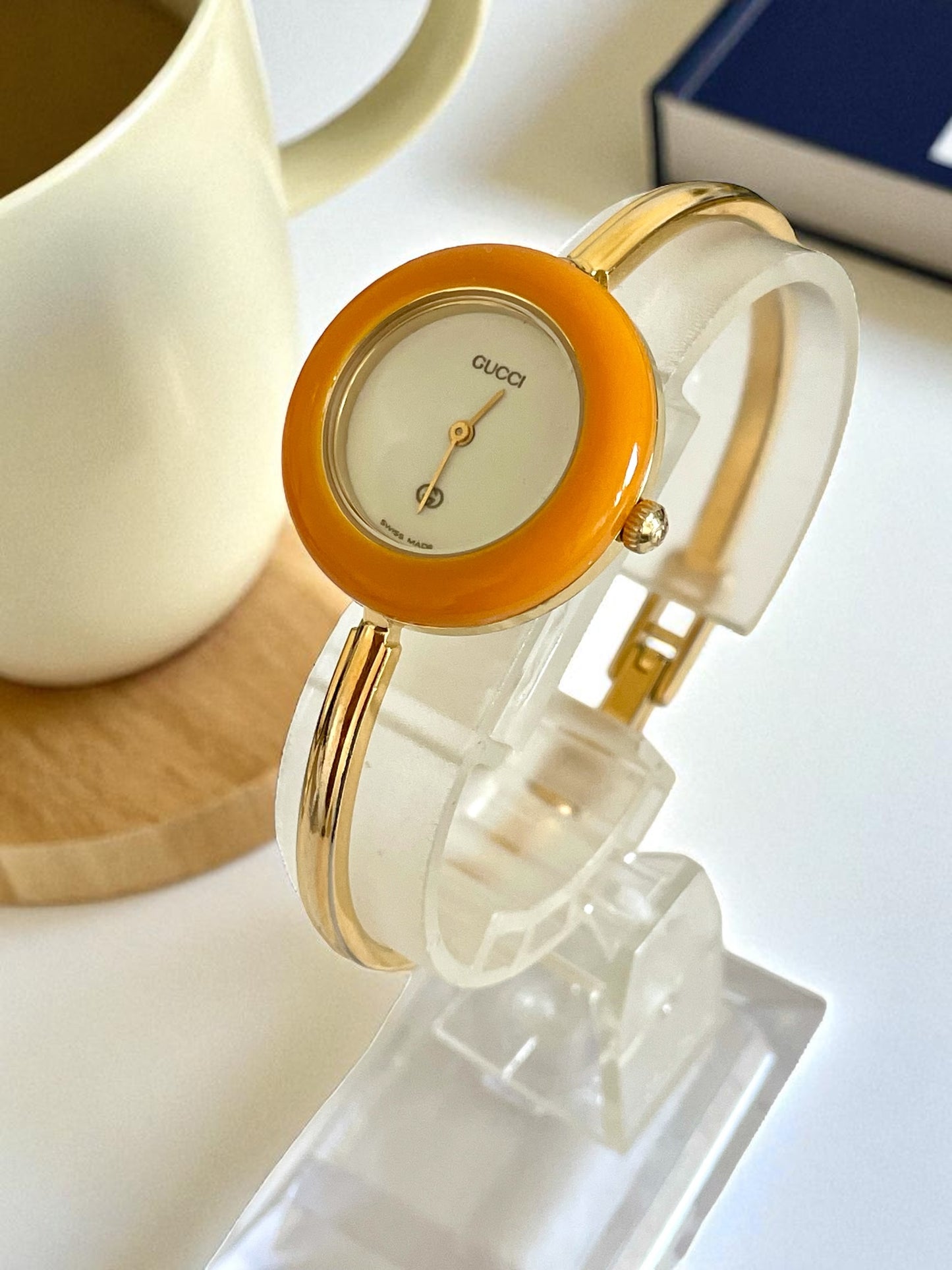 Vintage Gucci Women’s Watch – Gold Bangle with Interchangeable Orange Bezel